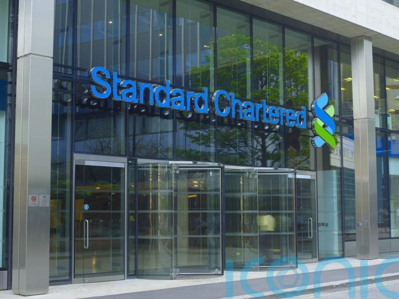 Standard Chartered unveils largest share buyback as profits lift