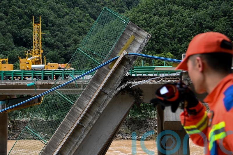 Death toll from China bridge collapse raised to 38 as two dozen still missing
