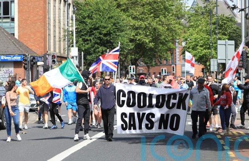 Harris expresses ‘disgust’ at Irish tricolour flown during attacks on police