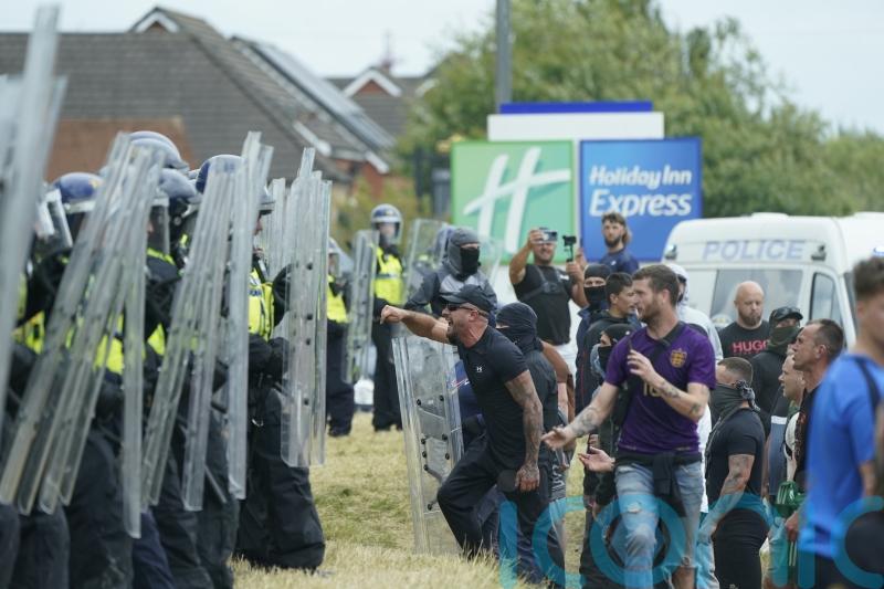 Cabinet minister promises ‘reckoning’ after disorder outside hotel in Rotherham