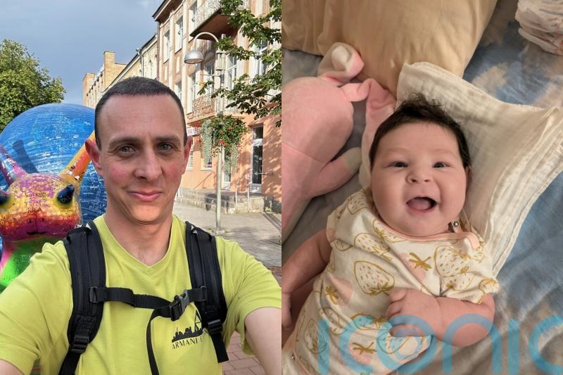 Dad in Belarus for baby through surrogacy forced to leave wife and daughter to save job as passport application drags on
