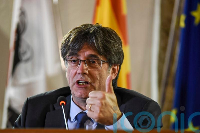 Fugitive ex-Catalan leader plans return to Spain despite threat of arrest