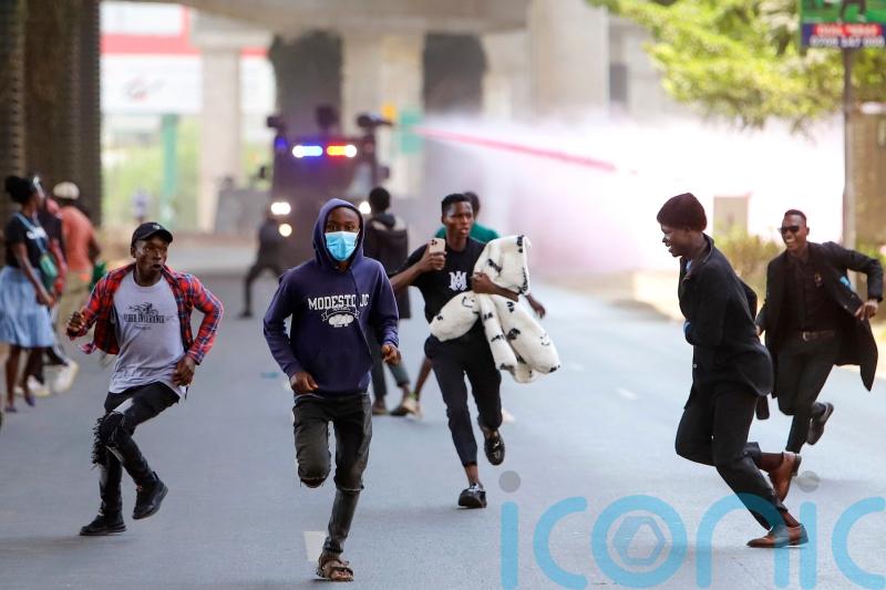 Police hurl tear gas at protesters in Nairobi as Kenya Cabinet sworn in