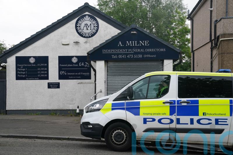Woman arrested in &lsquo;missing ashes&rsquo; probe into funeral directors
