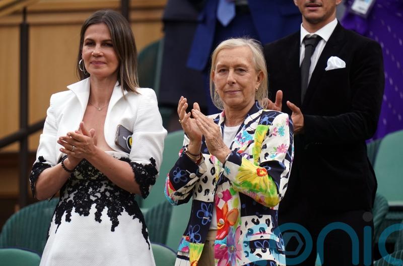Martina Navratilova and Julia Lemigova announce they have adopted two boys