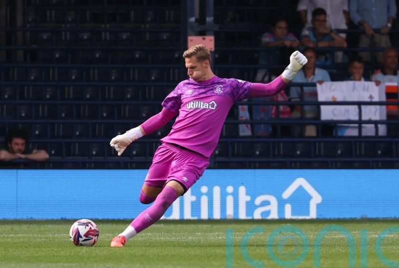 Luton battle to draw at Portsmouth after goalkeeper Thomas Kaminski sees red