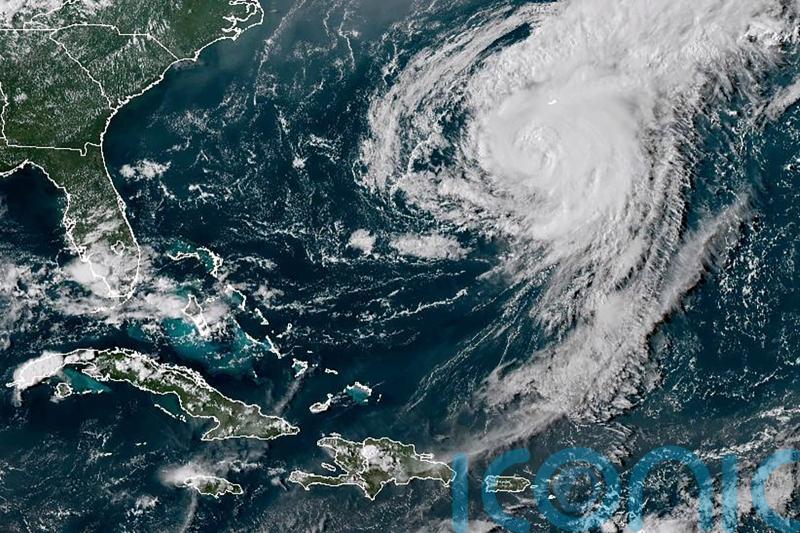 Hurricane Ernesto moves away from Bermuda to open waters