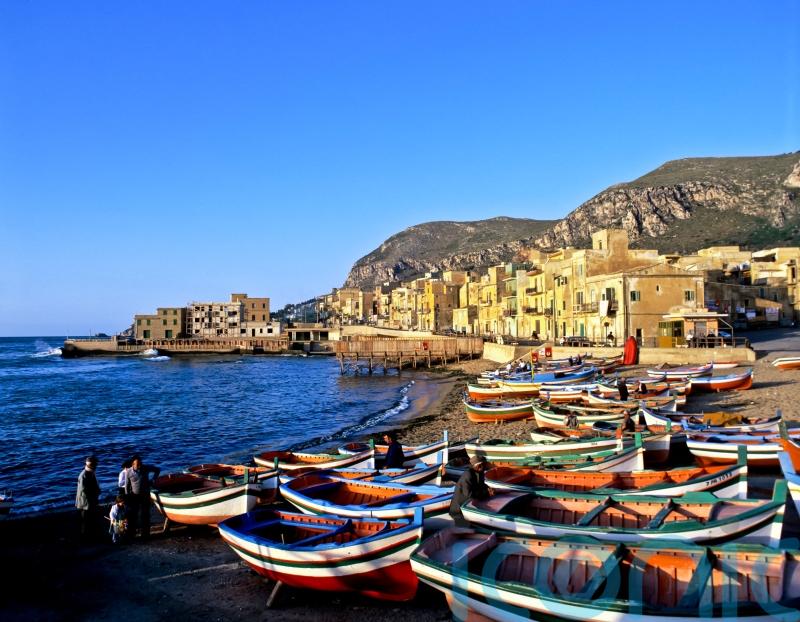One dead and six missing after boat carrying UK tourists sinks off Sicily