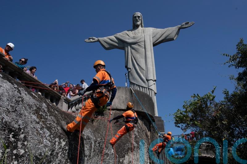 Rio de Janeiro climbers clean site of Christ the Redeemer statue