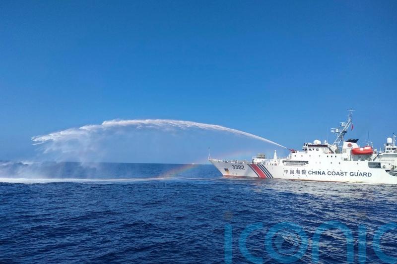 Chinese ship fires water cannons at Philippine vessel in disputed sea area
