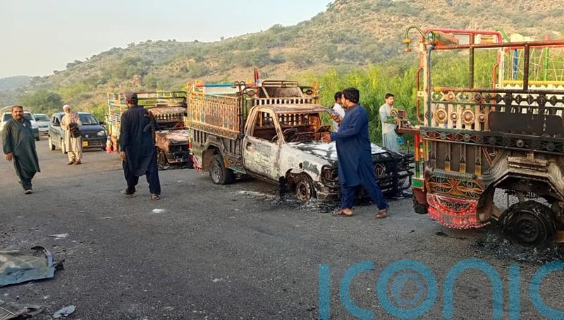Gunmen kill at least 31 people in two separate attacks in south-western Pakistan