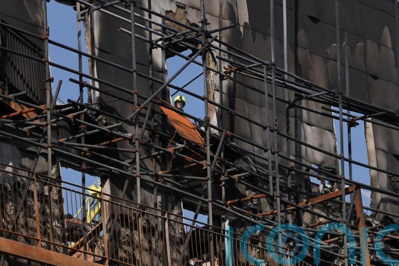 Far too much dangerous cladding on buildings, says deputy PM in fire scene visit