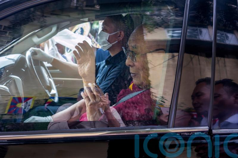Dalai Lama returns to Indian headquarters after knee replacement surgery in US