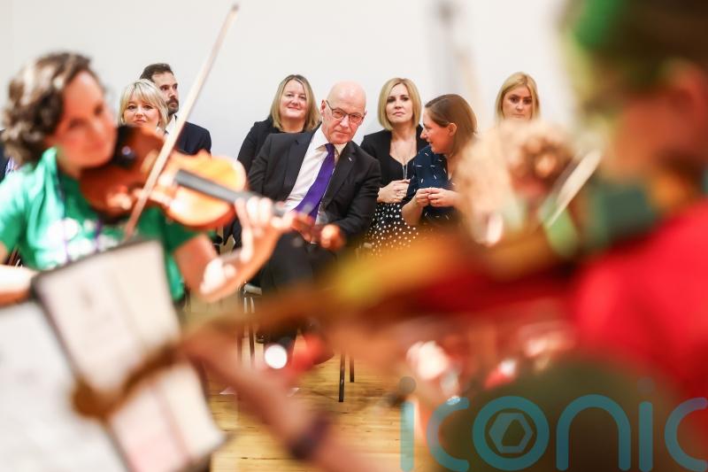 Swinney vows continued funding for music project ‘enriching lives of children’