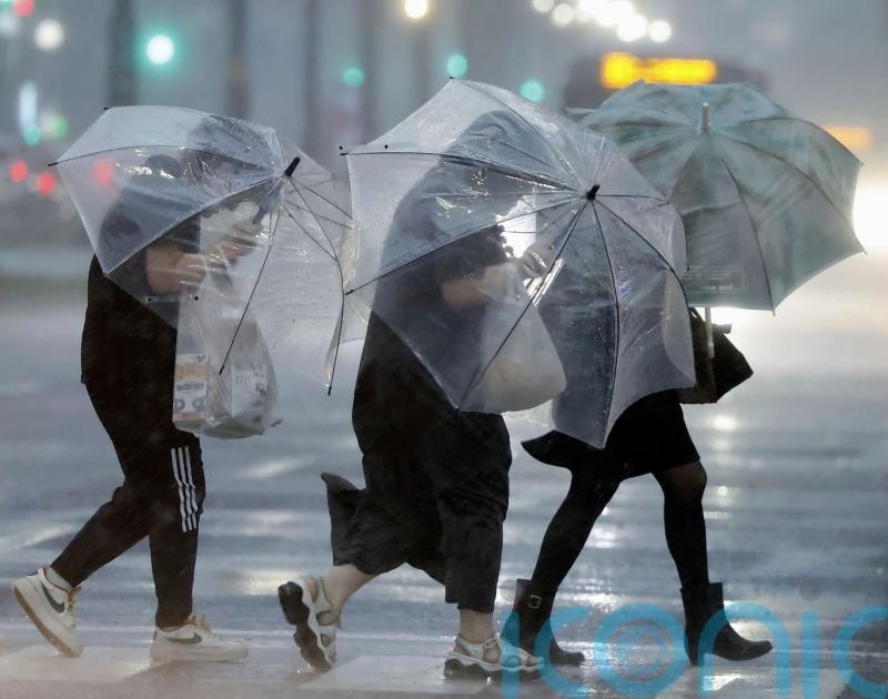 One dead and several injured as Typhoon Shanshan tears through Japan