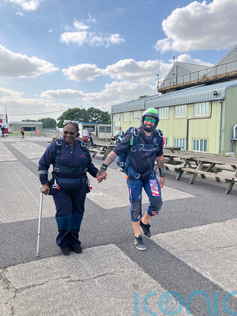 Retired nurse, 74, skydives to raise money for older people facing money worries