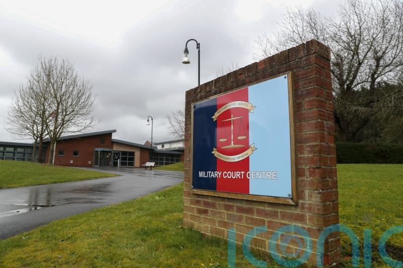 Major General drunkenly touched and kissed woman, court martial hears