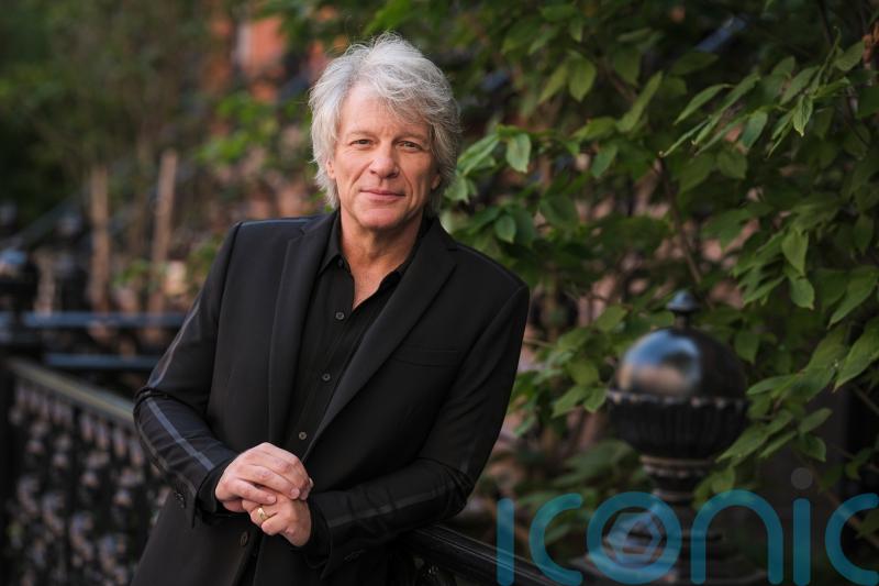 Jon Bon Jovi helps talk woman down from ledge on bridge