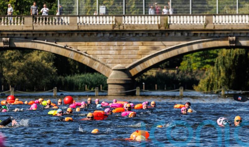 Thousands take a dip in Hyde Park’s Serpentine for open water festival