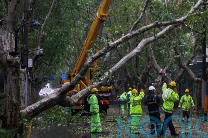 Two dead as Typhoon Bebinca hits east China before downgrading to tropical storm