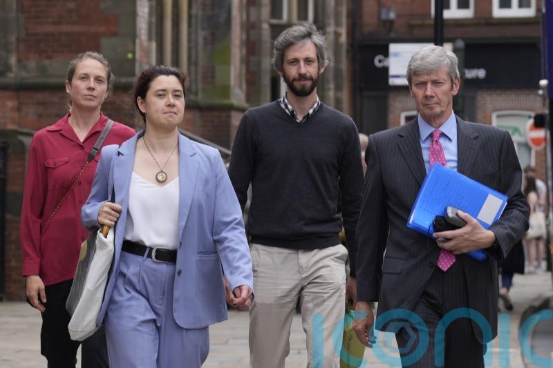 Judge throws out charges against Greenpeace activists who scaled Sunak’s home