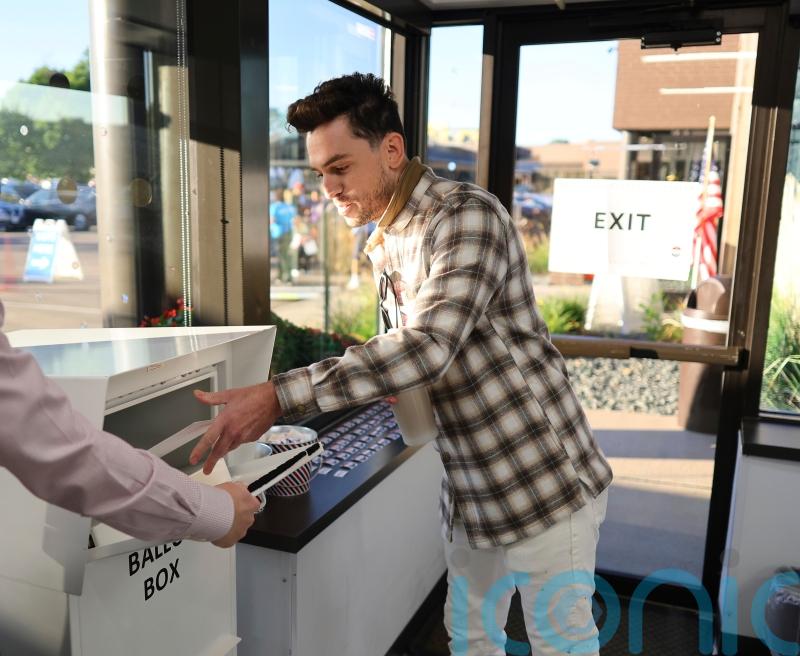 First in-person votes cast in US presidential election