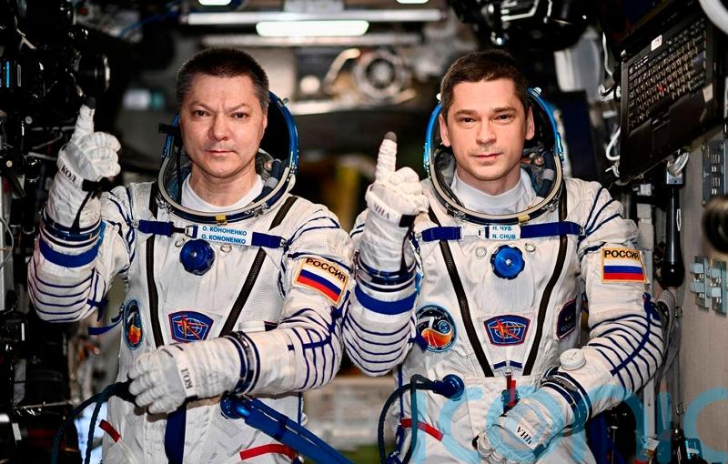 Capsule carrying record-breaking astronauts returning to Earth