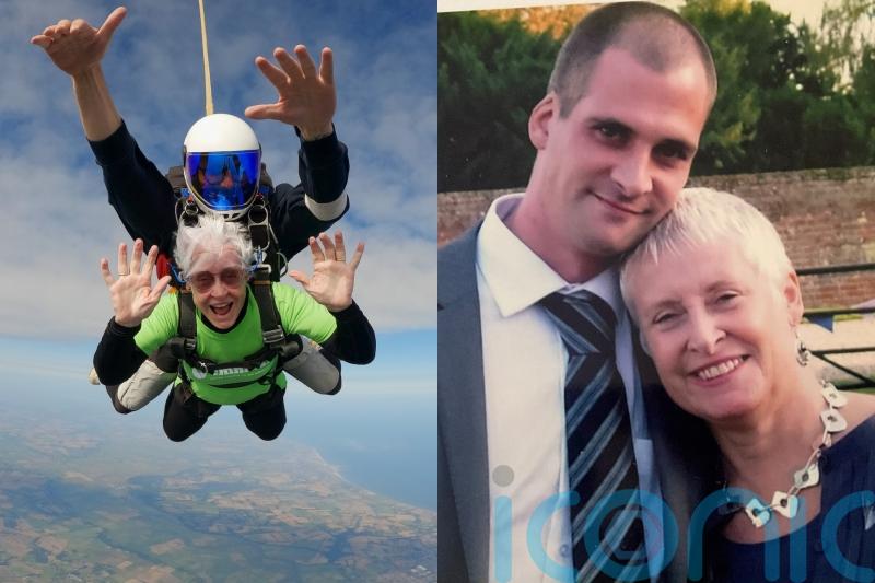 Great-grandmother, 71, completes charity skydive at 13,000ft in memory of ‘loving’ son who died after alcohol addiction