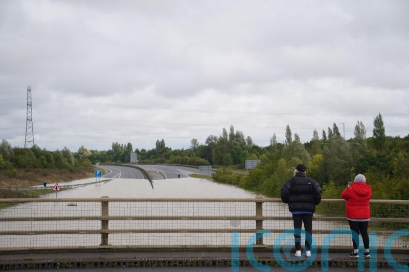 Commuters face road closures and disrupted rail services following flooding