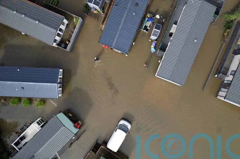More heavy rain on way as dozens of people evacuated from flooded holiday park
