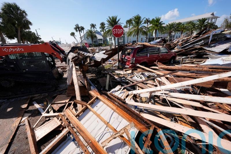 Rescuers race to free people trapped by Hurricane Helene as storm kills 35