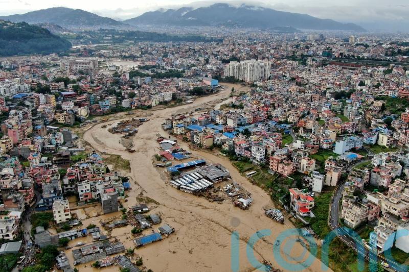 Flooding and landslides in Nepal kill at least 100