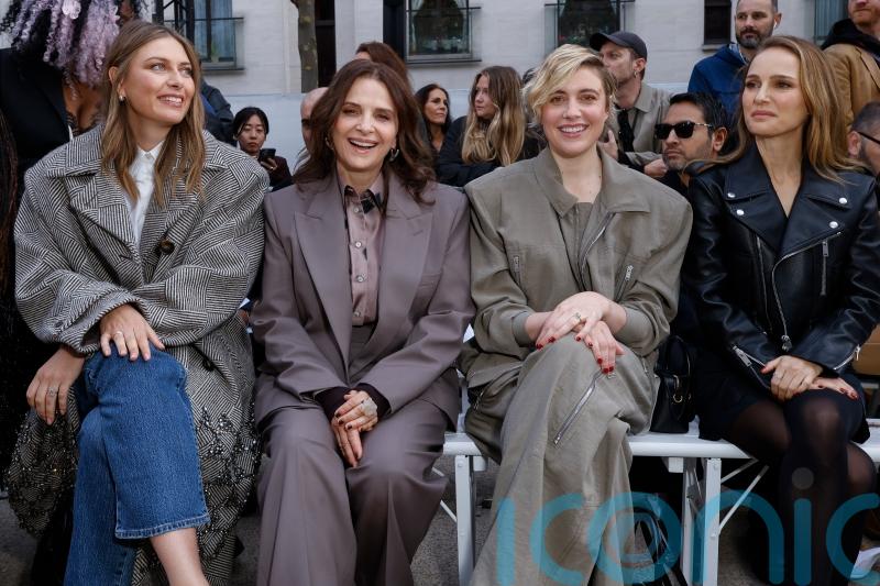 Natalie Portman, Greta Gerwig, Maria Sharapova and more sit in the rain to support Stella McCartney at Paris Fashion Week