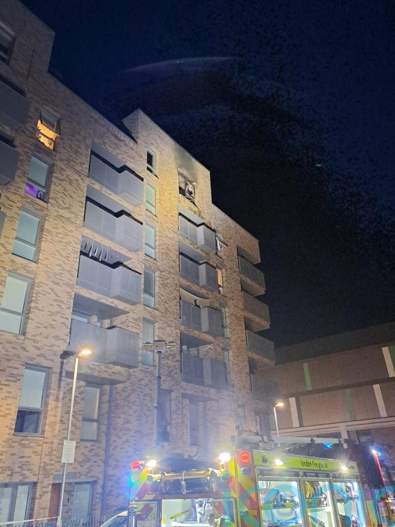 Two people taken to hospital after blaze in East London flat
