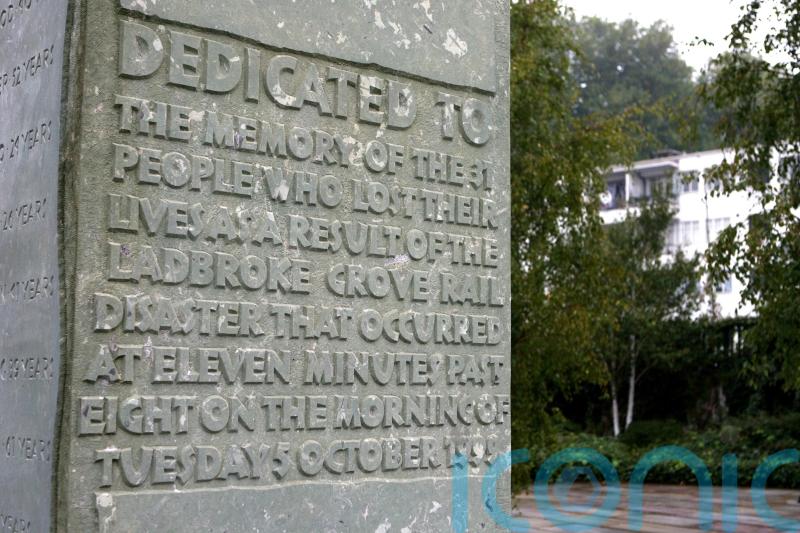 Flowers laid at Ladbroke Grove rail disaster memorial to honour those killed