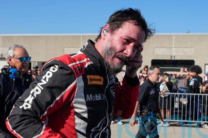 Keanu Reeves spins off track in professional racing car debut