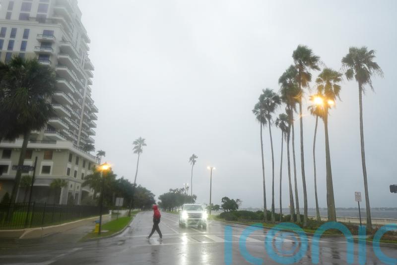 Warnings to flee as Hurricane Milton begins to lash Florida