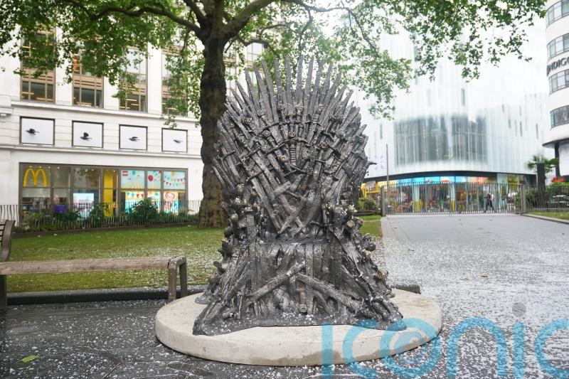 Game of Thrones dragon-forged Iron Throne fetches £1.1m at auction
