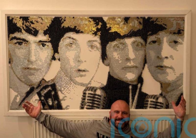 Graphic designer creates Beatles artwork using more than 24,000 screws