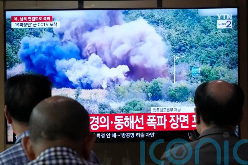 North Korea blows up parts of inter-Korean roads in symbolic display of anger