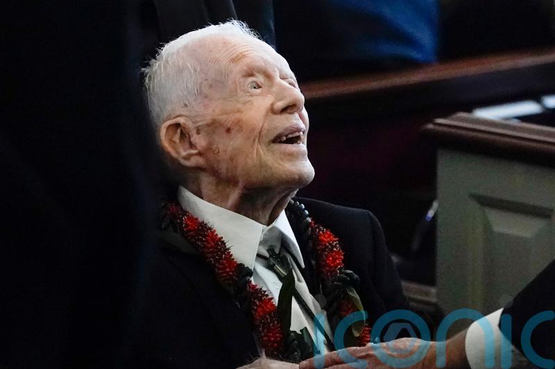 Former president Jimmy Carter, 100, votes in US election