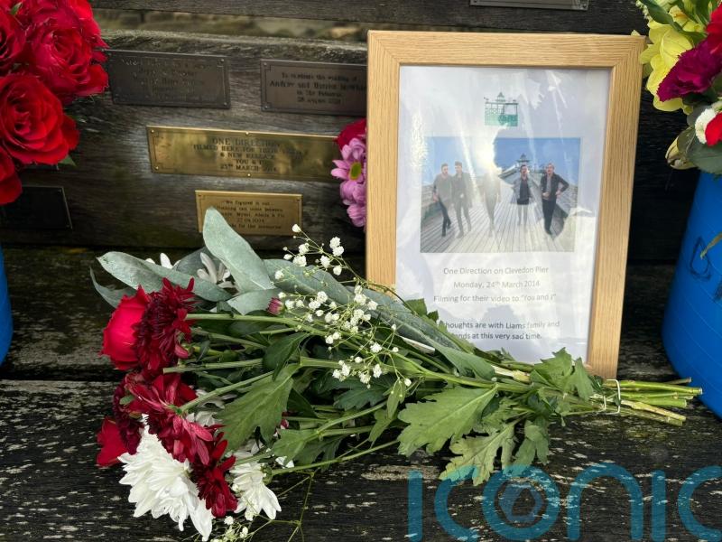 One Direction fans leave flowers on Somerset pier for Liam Payne