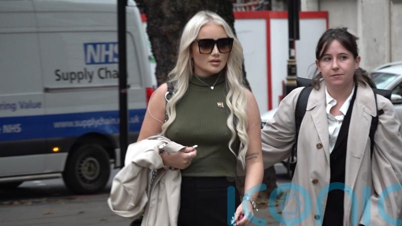 Woman admits assault by beating after throwing milkshake over Nigel Farage