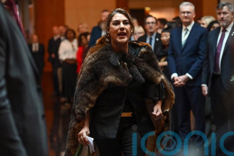 Woman charged with assaulting Australian senator who shouted at the King