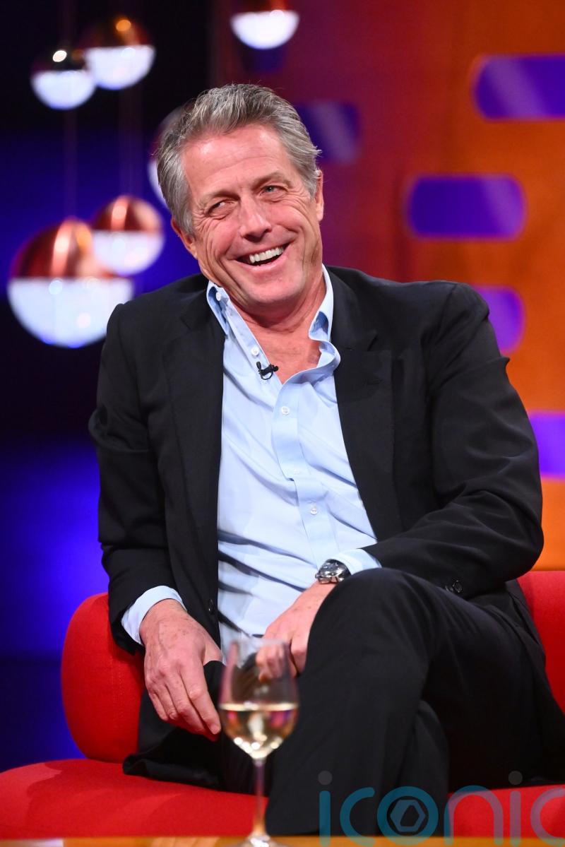 Hugh Grant on doing shots with Travis Kelce at Taylor Swift gig: We went crazy