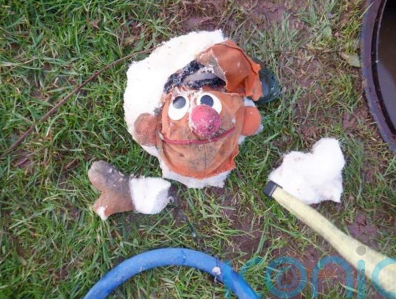 Nightmare on Sesame Street as Ernie teddy blocks sewer