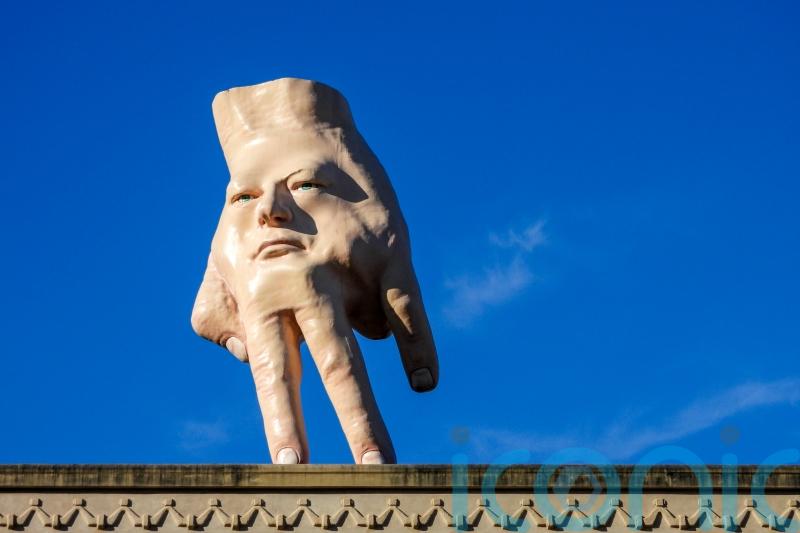 Controversial hand sculpture which towered over city to be removed