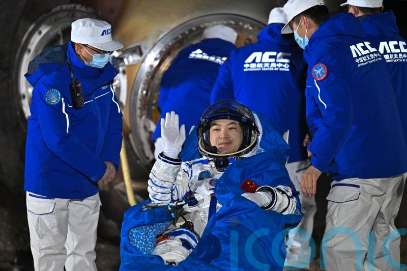 Chinese crew returns to Earth after six months in space