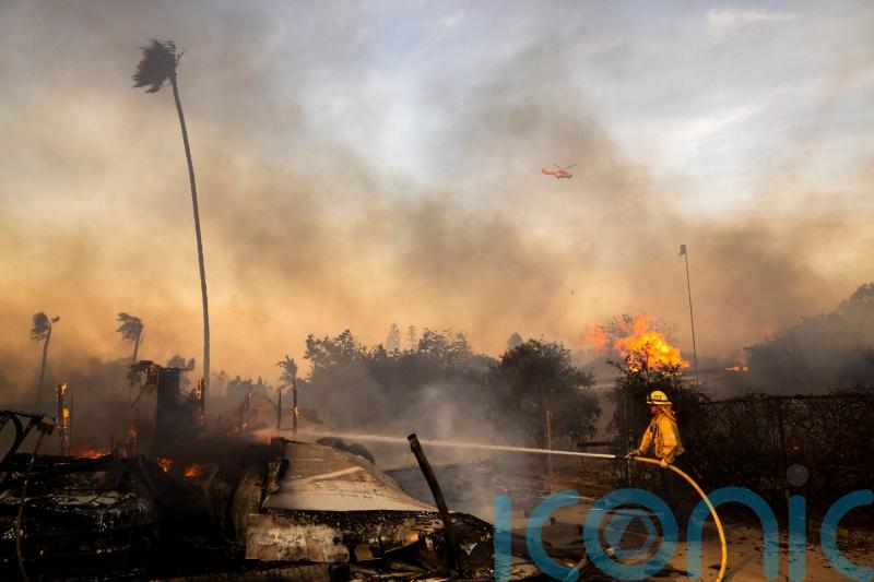 Firefighters gain ground on Calfornia wildfire as weather conditions improve
