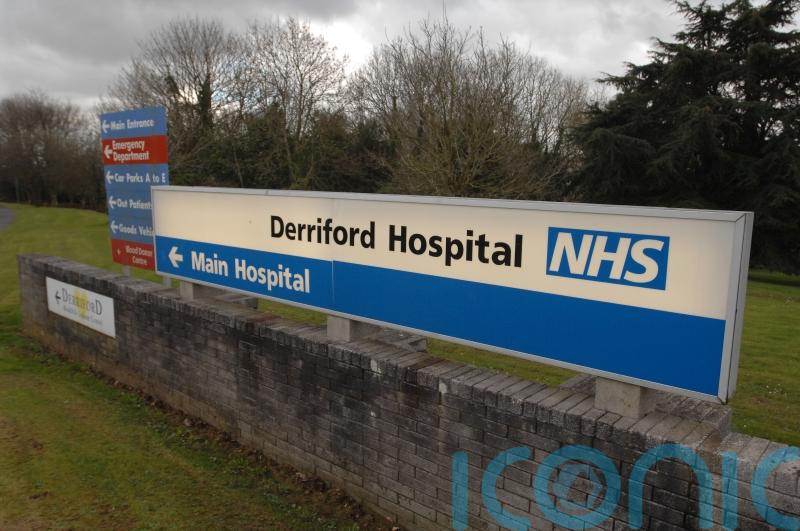 Pensioner died after being blown over by helicopter at hospital, inquest told